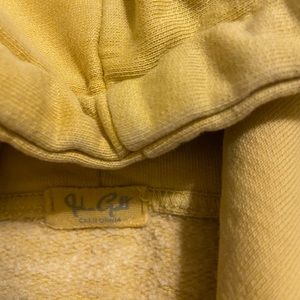 brandy melville yellow sweatshirt